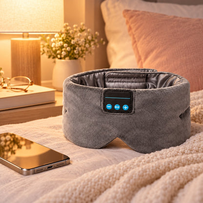 Lullune sleep mask next to a phone